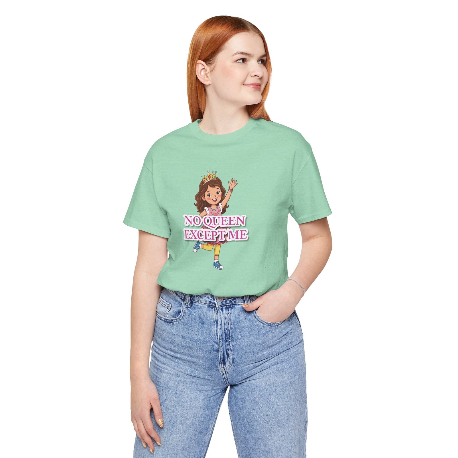 Girl wearing a mint green "No Queen Except Me Tee" with a whimsical crown illustration and pink lettering.