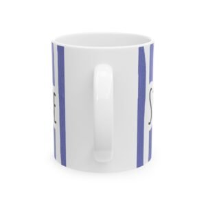 Periwinkle striped ceramic mug featuring hand-lettered 'Stay Under Blue' text and vertical brushstroke stripes.