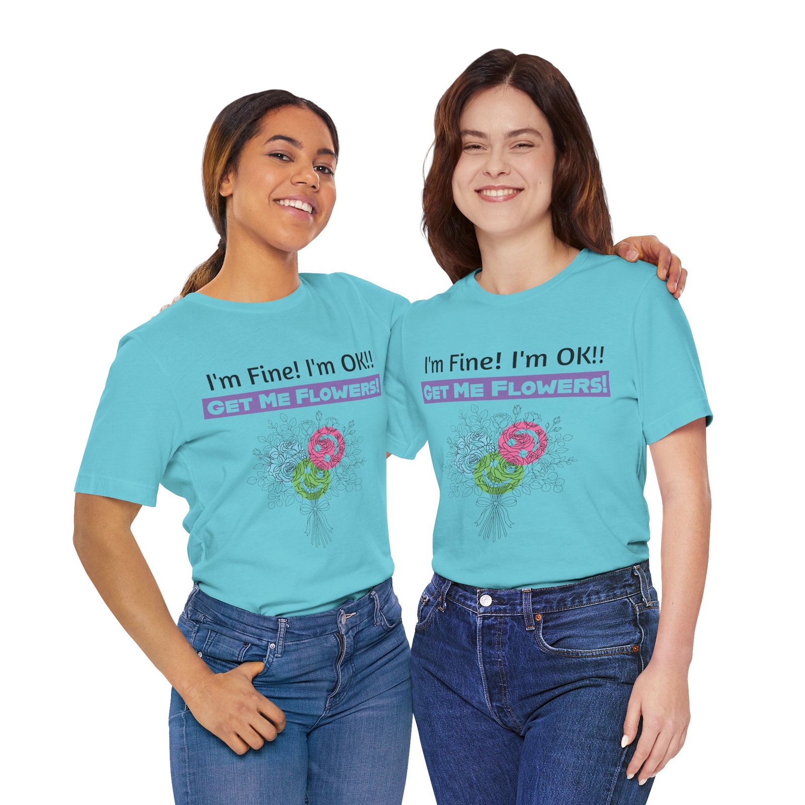 Two women smiling in light blue t-shirts with "I'm Fine! I'm OK!! GET ME FLOWERS!" and colorful floral graphics.