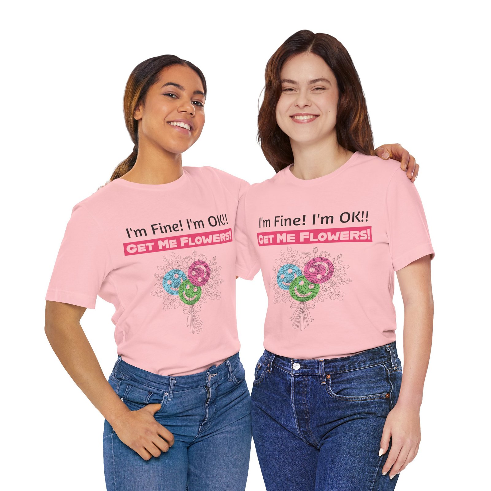 Two women smiling in pink crew-neck T-shirts featuring the text I'm Fine! I'm OK!! GET ME FLOWERS! and a floral graphic.
