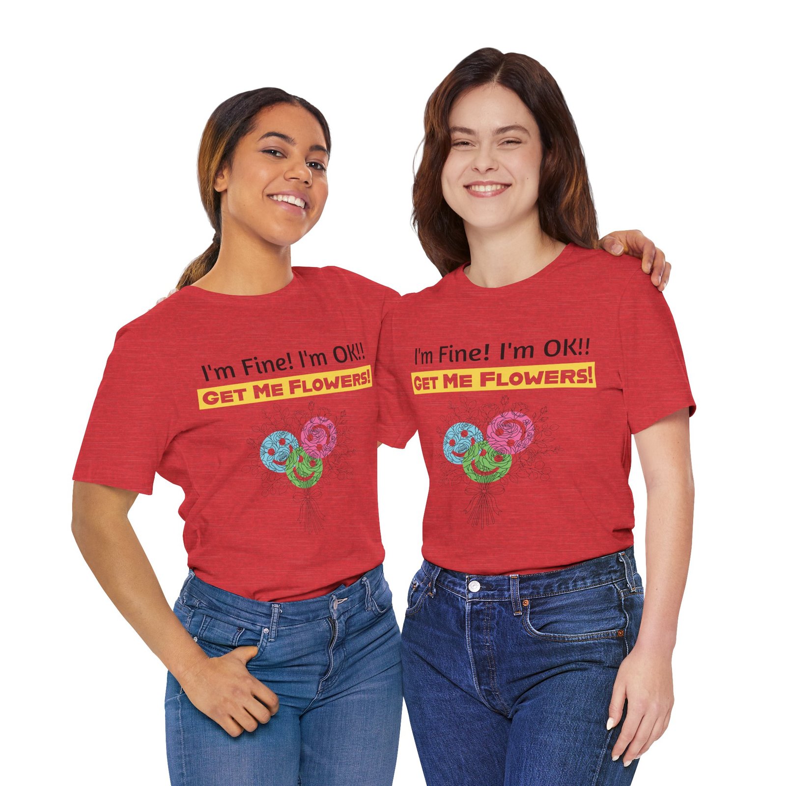 Two women smiling, wearing red crew-neck T-shirts with the graphic I'm Fine! I'm OK!! GET ME FLOWERS! and colorful blooms.