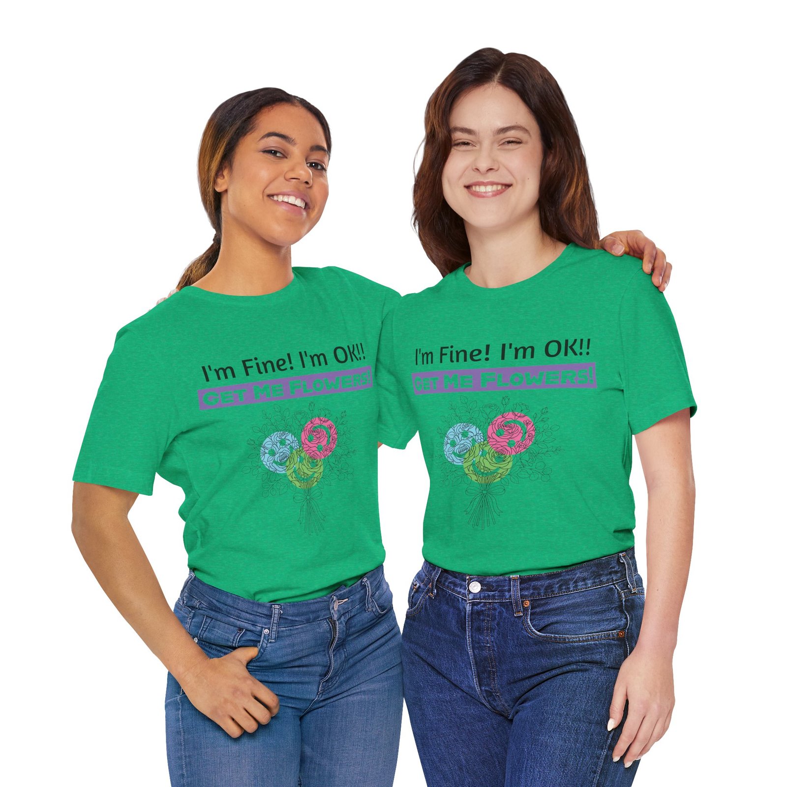 Two women wearing green graphic t-shirts with the text "I'm Fine! I'm OK!! GET ME FLOWERS!" and a floral bouquet.