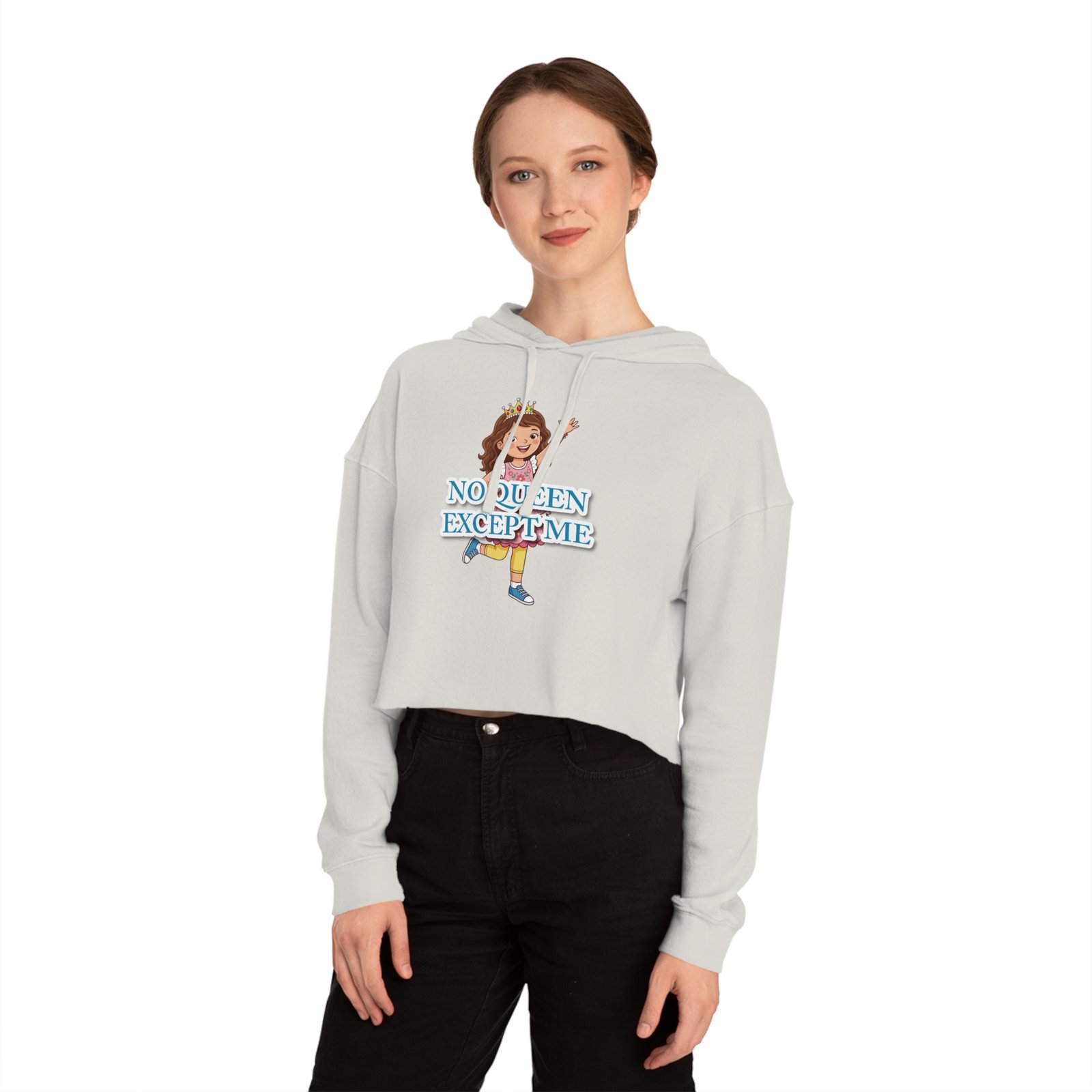 Woman wearing a light blue cropped hoodie featuring a crown-wearing character and "No Queen Except Me" text.