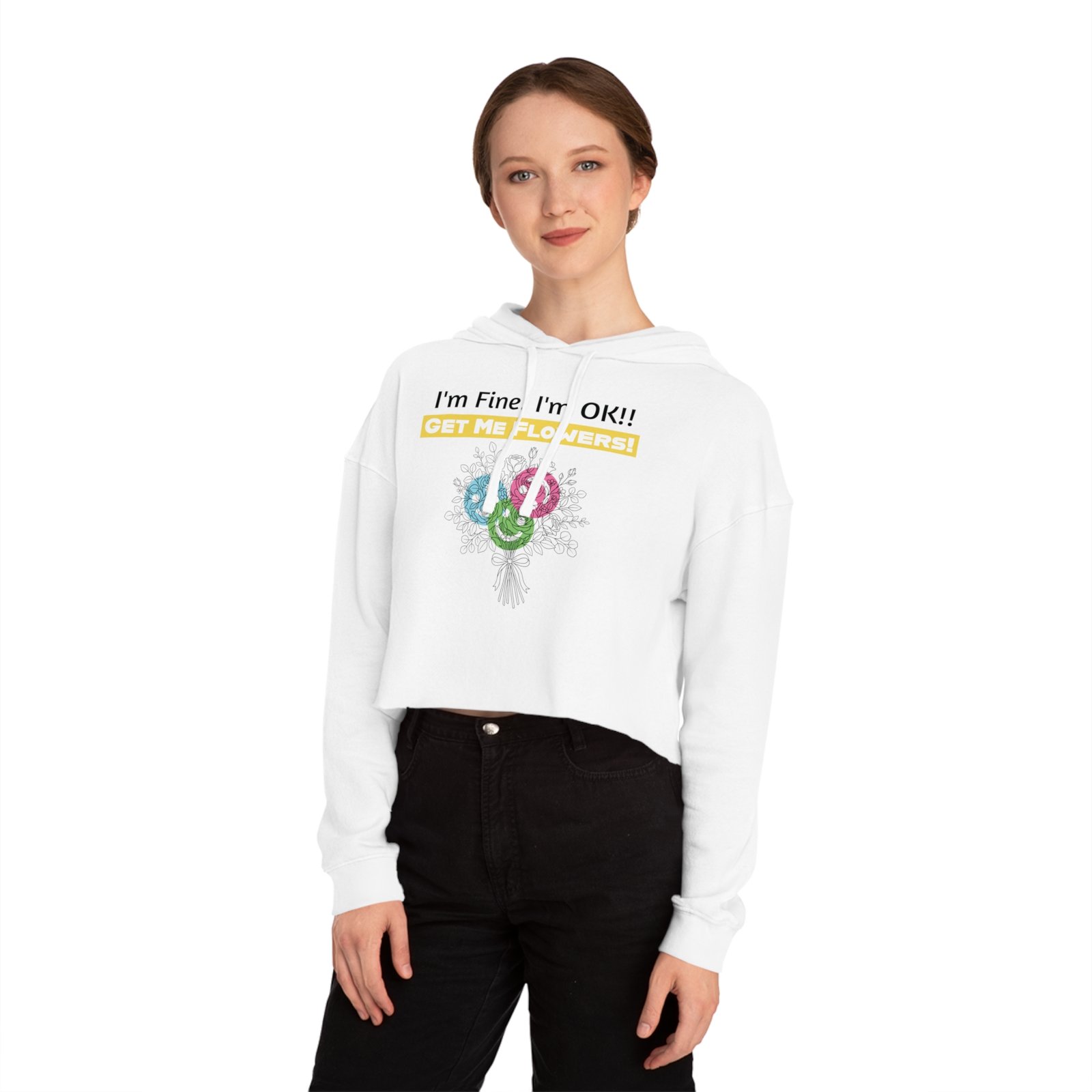 Woman wearing a white cropped hoodie with 'I'm Fine! I'm OK!! Get Me Flowers!' floral graphic and text.